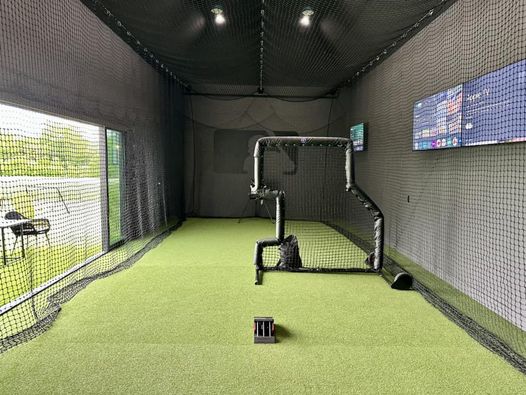 Indoor batting cage facility